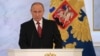 Russian President Vladimir Putin gives his annual state of the nation address in the Kremlin in Moscow, Dec. 1, 2016. 