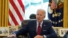 FILE PHOTO: U.S. President Joe Biden speaks before signing executive orders at the White House in Washington, Jan. 28, 2021.