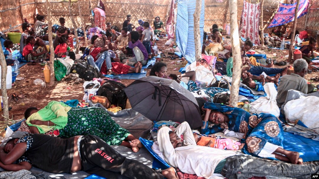 Ethiopian refugees who fled fighting in Tigray province lay in a hut at the Um Rakuba camp in Sudan's eastern Gedaref province, Nov. 16, 2020.