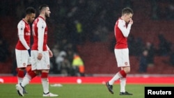 Klub Arsenal dalam pertandingan Premier League sebelum pandemi Covid-19 (foto: ilustrasi).