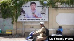 This billboard in Ho Chi Minh City tells drivers not to drink and drive, as part of a government campaign to cut down on the country’s high rate of traffic fatalities.