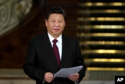 FILE- In February Chinese President Xi Jinping asked journalists to "enhance their awareness to align their ideology, political thinking and deeds to those of the CPC Central Committee."