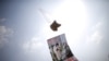 A balloon containing leaflets denouncing North Korean leader Kim Jong Un is seen near the demilitarized zone separating the two Koreas in Paju, South Korea, March 26, 2016.