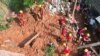 Foto dari udara menunjukkan tim penyelamat bekerja di lokasi tanh longsor di wilayah Bethania, Ipatinga, negara bagian Minas Gerais, Brasil, pada 12 Januari 2025. (Foto: AFP/Nilmar Lage)