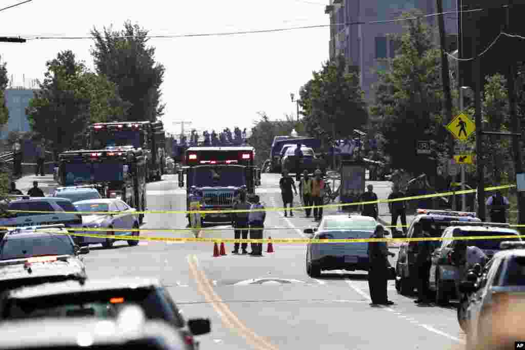 Alexandria police and other first responders block East Monroe Ave., June 14, 2017, after a shooting involving House Majority Whip Steve Scalise, at a congressional baseball practice.