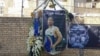 In this image shared widely online, tributes are displayed outside the home of Iranian wrestler Navid Afkari in the city of Shiraz, after Iran executed him on September 12, 2020 for a murder confession that he said was obtained under torture.