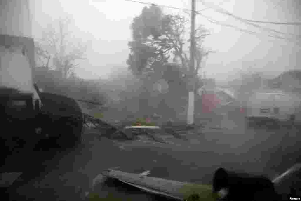 Damage and flooded streets are seen after the area was hit by Hurricane Maria in Guayama, Puerto Rico, Sept. 20, 2017.