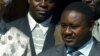 FILE - Former South African President Nelson Mandela, center, poses with President Domitien Ndayizeye, left, and Jean Minani, speaker of Burundi parliament, July 21, 2004.