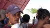 Haitians Seeking National ID Cards Say Government Is Violating Its Own COVID-19 Directives