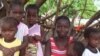 One of the women of Tambacounda region of Senegal who took part this year in "Operation Tabaski" with her children, 23 Nov 2009