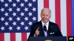 FILE - US President Joe Biden speaks about his infrastructure plan and his domestic agenda during a visit to the Electric City Trolley Museum in Scranton, Pa., Oct. 20, 2021.