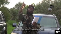 Video screen shot of Nigerian Islamist extremist group Boko Haram leader and obtained by AFP shows Abu Bakr Shekau, delivering a speech at an undisclosed location, Aug. 24, 2014.
