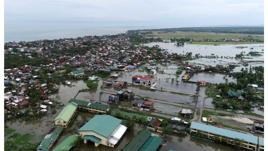 Floodwaters caused by typhoon Vongfong inundate a village as it passed by Sorsogon province, eastern Philippines on May 15, 2020.