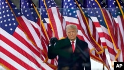 President Donald Trump arrives to speak at a rally, Jan. 6, 2021, in Washington.