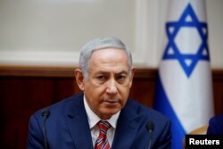 Israeli Prime Minister Benjamin Netanyahu attends the weekly cabinet meeting at the prime minister's office in Jerusalem, June 17, 2018.