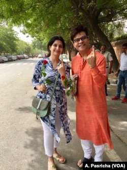 Many in India like this couple in New Delhi said that it is important to cast one's vote.