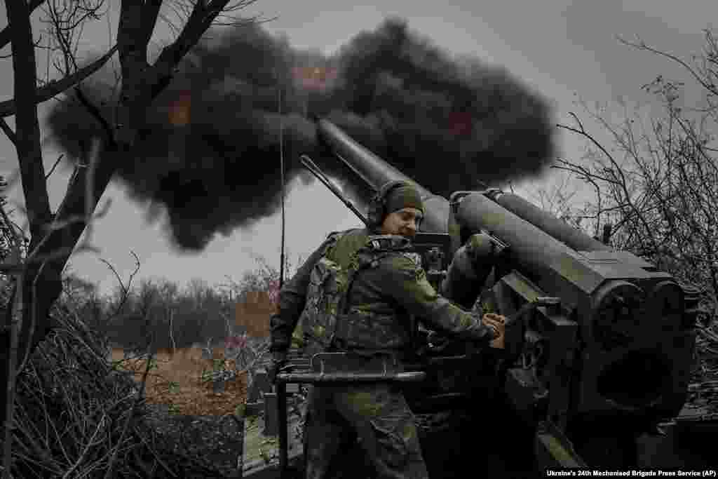 Servicemen of the 24th Mechanised Brigade fire 2s5 self-propelled 152mm howitzer towards Russian positions near Chasiv Yar, Donetsk region, Ukraine, Nov. 18, 2024.
