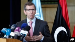 FILE - U.N. Special Representative for Libya Bernardino Leon gives a statement to journalists as Libyan peace talks resume in Skhirat, Morocco, Aug. 28, 2015.