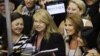 Minnesota Representative Michele Bachmann, second right, listens as Minnesota delegates casts their vote for Romney during Republican Convention, Aug. 28, 2012 