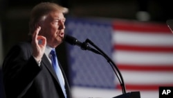 President Donald Trump speaks at Fort Myer in Arlington, Virginia, Aug. 21, 2017, during a presidential address on U.S.-Afghanistan strategy.