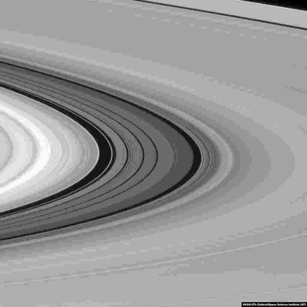 This Jan. 28, 2016 image made available by NASA shows Saturn's rings, including the darker series of bands called the Cassini Division between the bright B ring, left, and dimmer A ring, right.