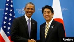 日本首相安倍晉三(右）下周訪問華盛頓期間，將會和美國總統奧巴馬（左）會面。