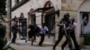Kenyans Mark a Year Since the Hotel attack, for Some the Pain Lingers
