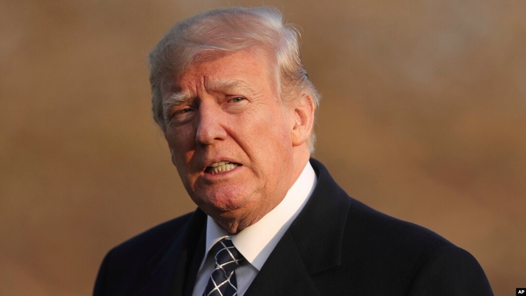 U.S. President Donald Trump walks across the South Lawn of the White House in Washington, March 25, 2018, after returning from his Mar-a-Lago estate in Palm Beach, Florida.
