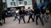 FILE - Pro-Ukrainian activists clash with pro-Russia activist during a pro-Ukraine rally in Donetsk, Ukraine.