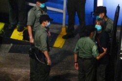 Pro-democracy activist Leung Kwok-hung arrives at Lai Chi Kok Reception Center by prison van after being sentenced for unauthorized assembly, in Hong Kong, China, April 16, 2021.