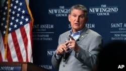 FILE - Sen. Joe Manchin, D-W.Va., speaks in Manchester, New Hampshire, Jan. 12, 2024. 