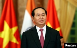 FILE - Vietnam's President Tran Dai Quang stands at the Presidential Palace in Hanoi, Vietnam, Sept. 3, 2016.