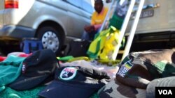 Some of the items of Collin Nkadimeng's stand on the street outside of the Medi-Clinic Heart Hospital in Pretoria, where former South African President Nelson Mandela has been treated since June 8. (Photo: Peter Cox / VOA)