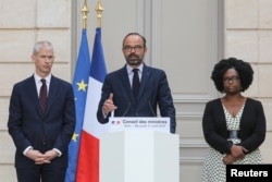 French Culture Minister Franck Riester, French Prime Minister Edouard Philippe and French Junior Minister and Government's spokesperson Sibeth Ndiaye attend a news conference after the weekly cabinet meeting, dominated by the aftermath of the Notre-Dame c