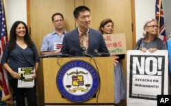 FILE - Hawaii Attorney General Douglas Chin speaks in Honolulu, about President Donald Trump's travel ba, June 30, 2017.
