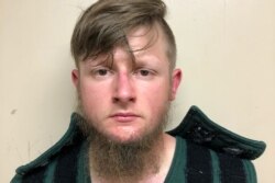 Robert Aron Long, 21, iz Vudstoka, okrug Čiroki, pozira u zatvoru za fotografiju za dosije, nakon što ga je služba šerifa okruga Krisp privela kao osumnjičeni za više pucnjava i ubistava, u Kordelu, Džordžija 16. marta 2021. (Foto: Kancelarija Šerifa, preko Rojtersa)