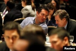 U.S. Representative Devin Nunes (R-CA), chairman of the House Freedom Caucus, listens as President Donald Trump addresses the Republican congressional retreat at the Greenbrier resort in White Sulphur Springs, West Virginia, Feb. 1, 2018.
