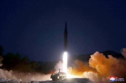 This picture taken on Jan. 11, 2022, and released from North Korea's official Korean Central News Agency on Jan. 12, 2022, shows what North Korea says a hypersonic missile test-fire conducted by the Academy of Defence Science of the DPRK at an undisclosed location.