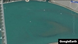 Aerial image from GoogleEarth shows section of dam constructed along Tibet's Lhasa River, October 2015.