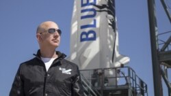 FILES) This file handout photo taken on April 24, 2015 obtained courtesy of Blue Origin shows Jeff Bezos, founder of Blue Origin, at New Shepard's West Texas launch facility before the rocket's maiden voyage.
