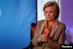 FILE - Former U.S. Secretary of State Hillary Clinton takes part in the Women for Women International Luncheon in New York, May 2, 2017.