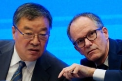 China, Wuhan, Peter Ben Embarek, a member of the World Health Organization, and Liang Wannian head of expert panel on COVID-19 response at China's National Health Commission