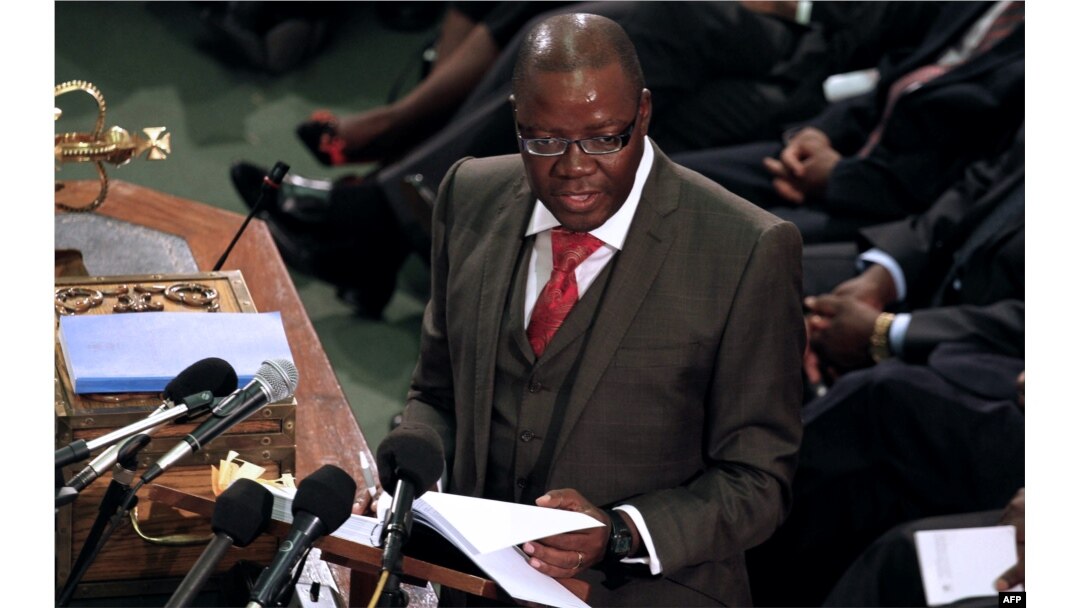 FILE - Zimbabwe's Finance Minister Tendai Biti delivers his speech about the 2013 budget at the Parliament in Harare, Zimbabwe, November 15, 2012.