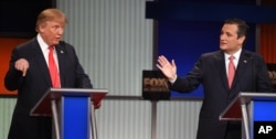 FILE - Republican presidential candidate businessman Donald Trump, left, and rival Sen. Ted Cruz, R-Texas, both speak during the Republican presidential debate in North Charleston, S.C, Jan. 14, 2016.