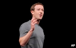 Facebook CEO Mark Zuckerberg gestures during the Samsung Galaxy Unpacked 2016 event on the eve of this week’s Mobile World Congress wireless show, in Barcelona, Spain, Feb. 21, 2016.