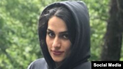 Iranian student and activist Maryam Faraji, 33, arrested in early January for participating in anti-government protests, is seen in this undated image shared on social media.