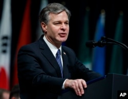 FILE - FBI Director Christopher Wray speaks during the FBI National Academy graduation ceremony, Dec. 15, 2017, in Quantico, Va.