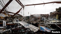 A supermarket was damaged after the area was hit by Hurricane Maria, Guayama, Puerto Rico Sept. 20, 2017.