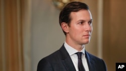 FILE - In this Friday, Aug. 11, 2017 file photo, White House senior adviser Jared Kushner listens as President Donald Trump answer questions. Kushner and other top Trump aides have been visiting the region to meet with Palestinians, Israelis and officials from neighboring Arab nations as it prepares to put forward a peace plan.