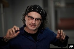 Lebanese director Ziad Doueiri is seen during an interview with Associated Press in Paris, France, Jan. 24, 2018.